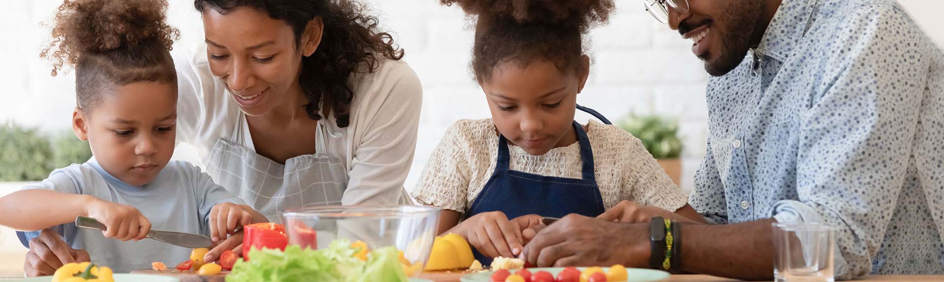 family preparing a meal together